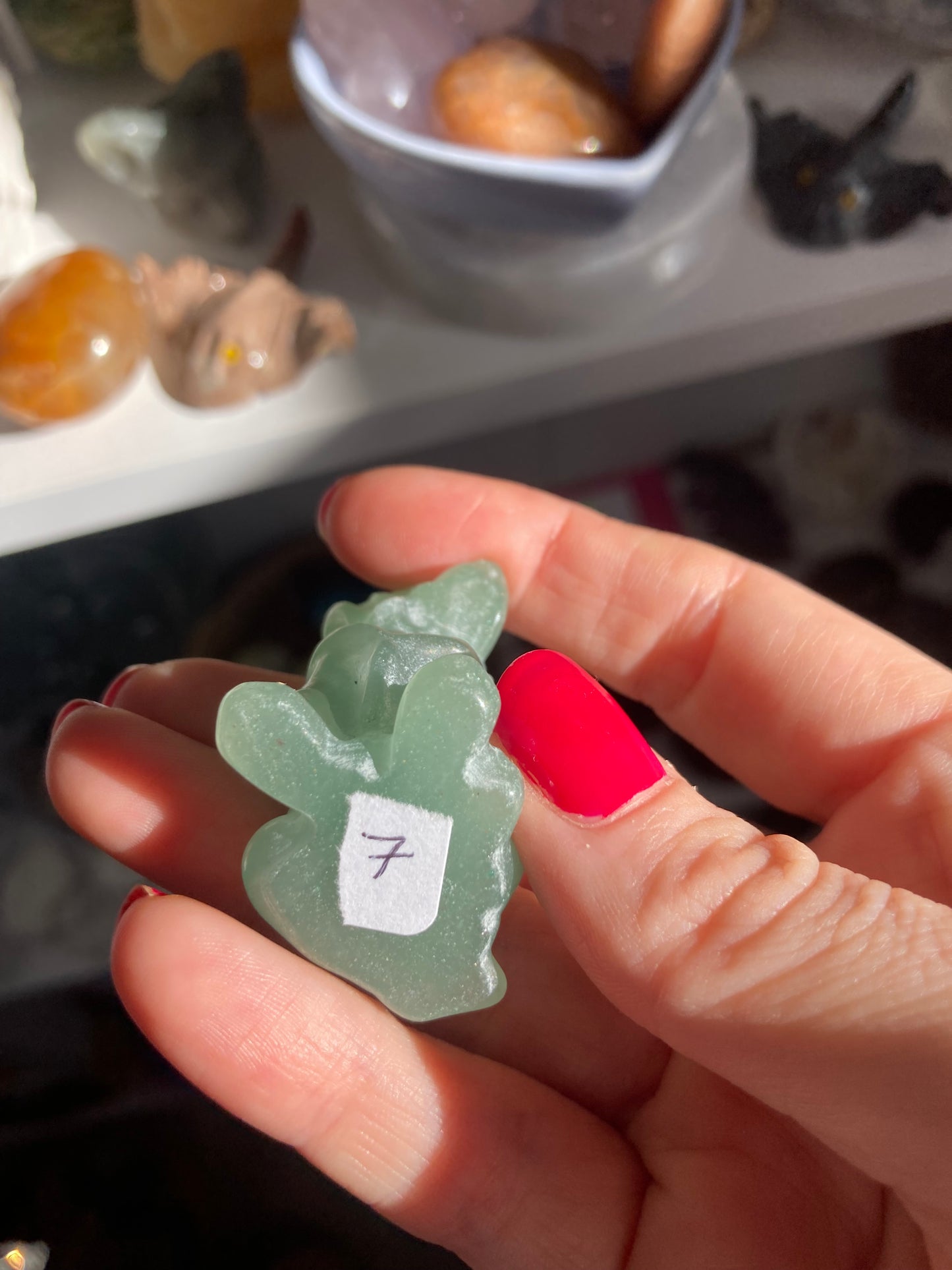 Green aventurine dog carving