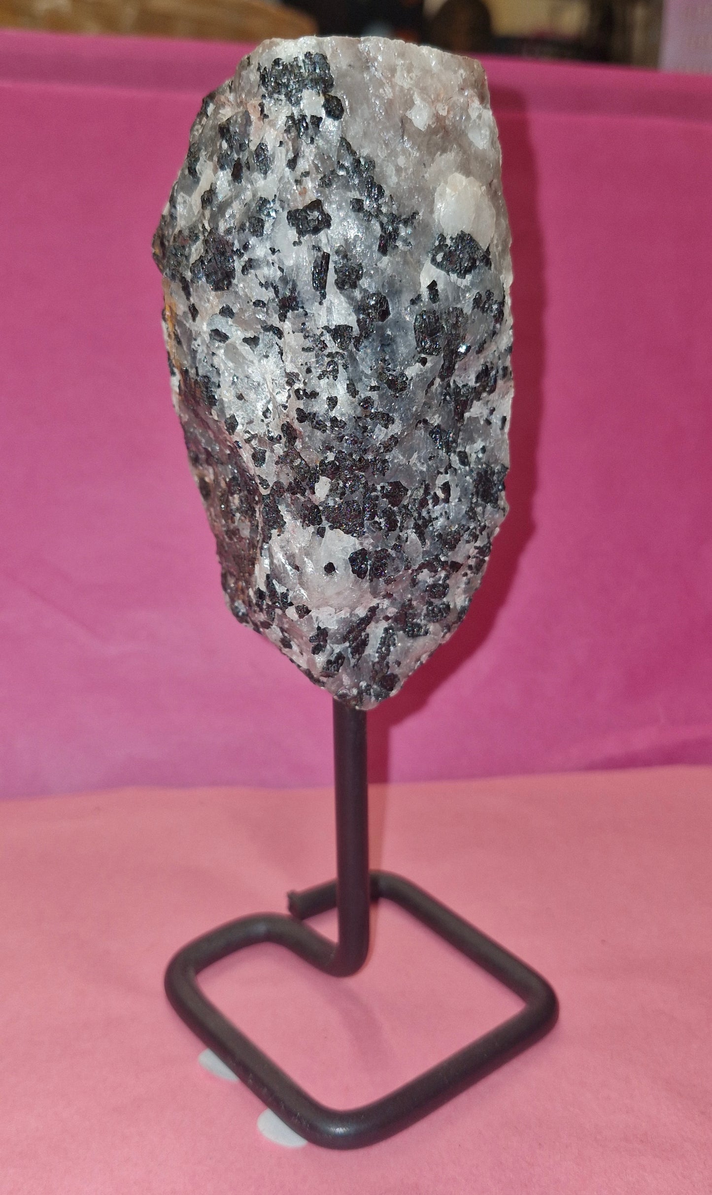 Raw tourminalated quartz on stand