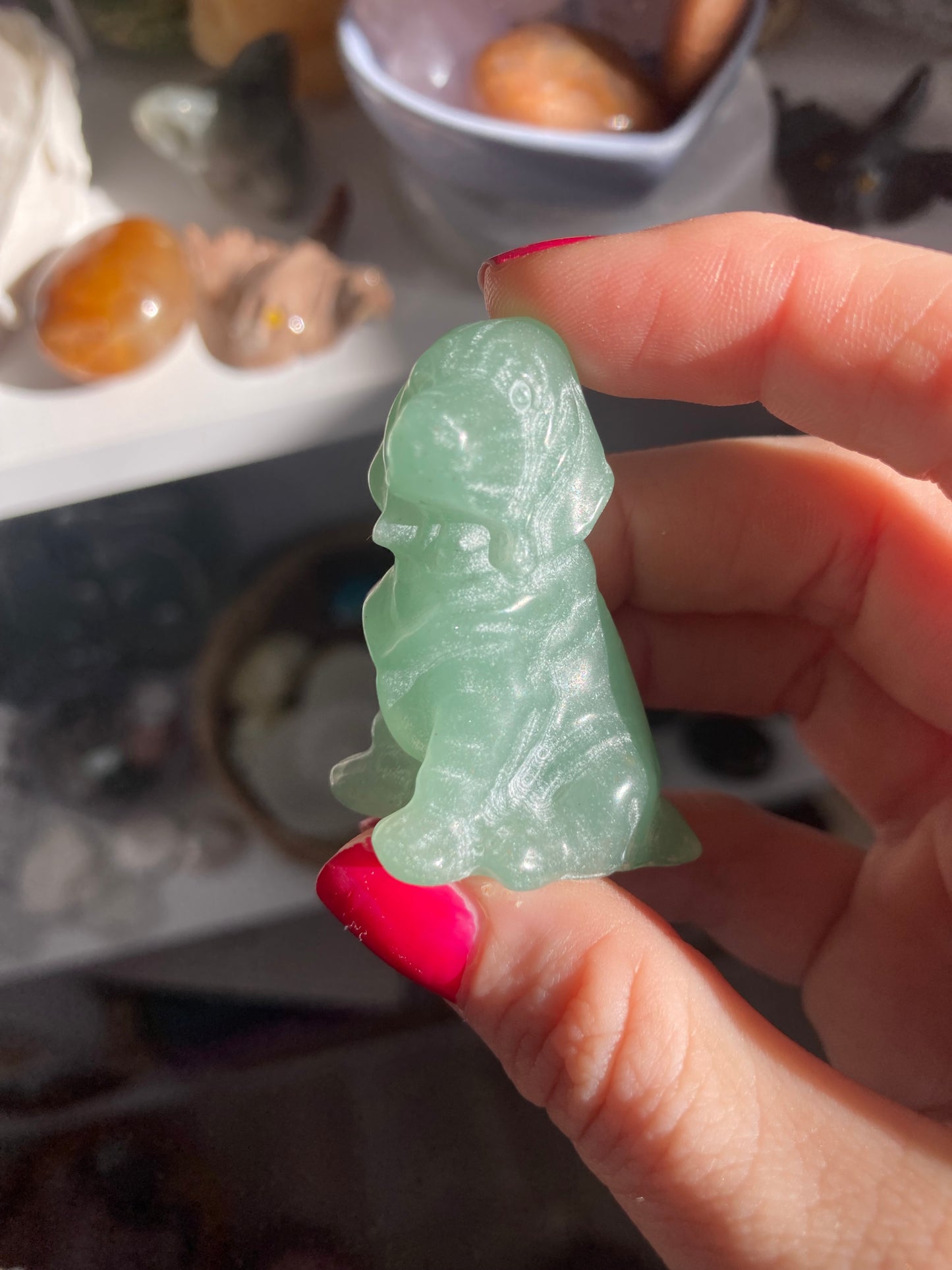 Green aventurine dog carving