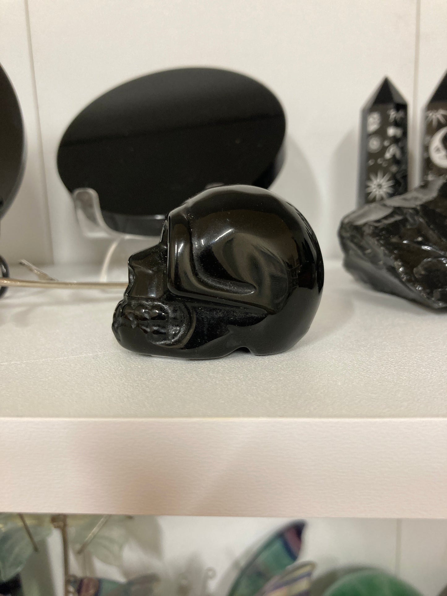 Obsidian skull carving