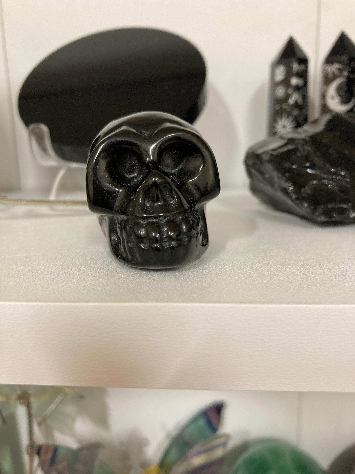 Obsidian skull carving