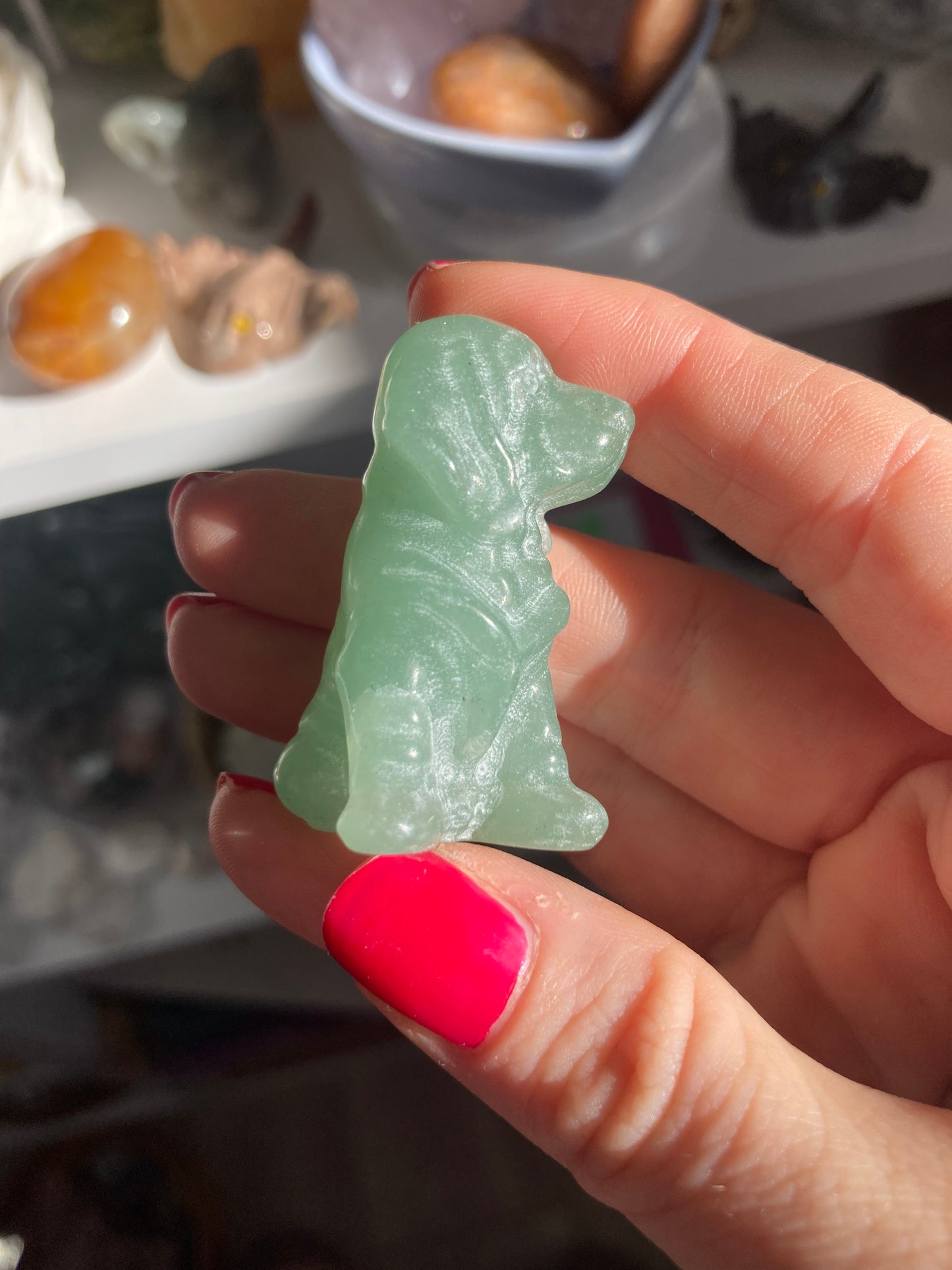Green aventurine dog carving