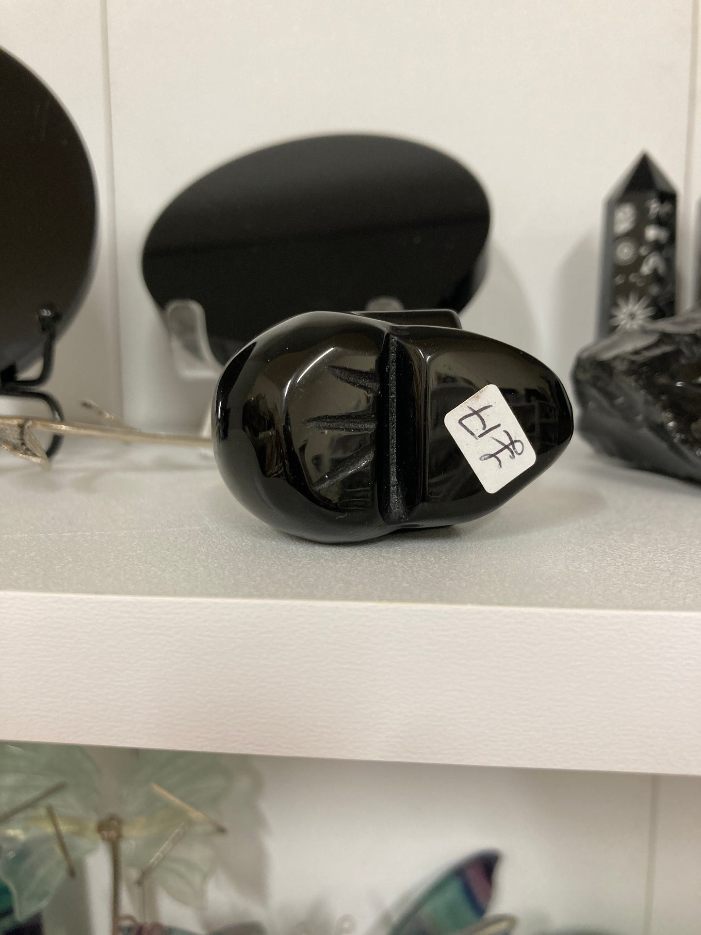 Obsidian skull carving