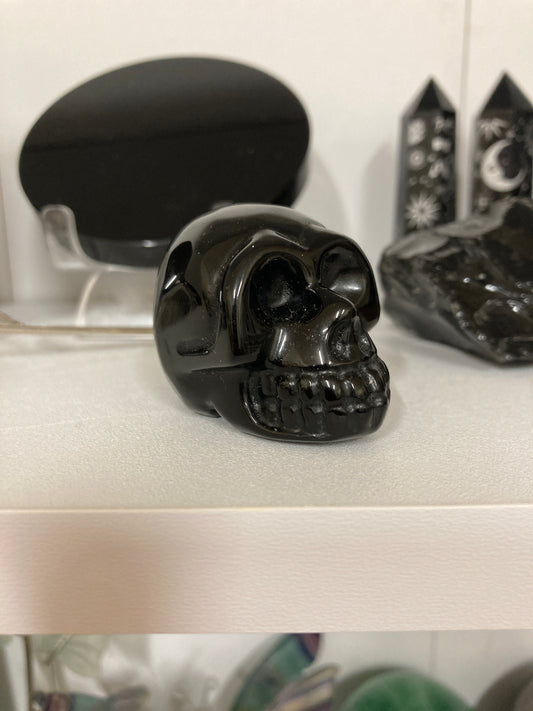 Obsidian skull carving
