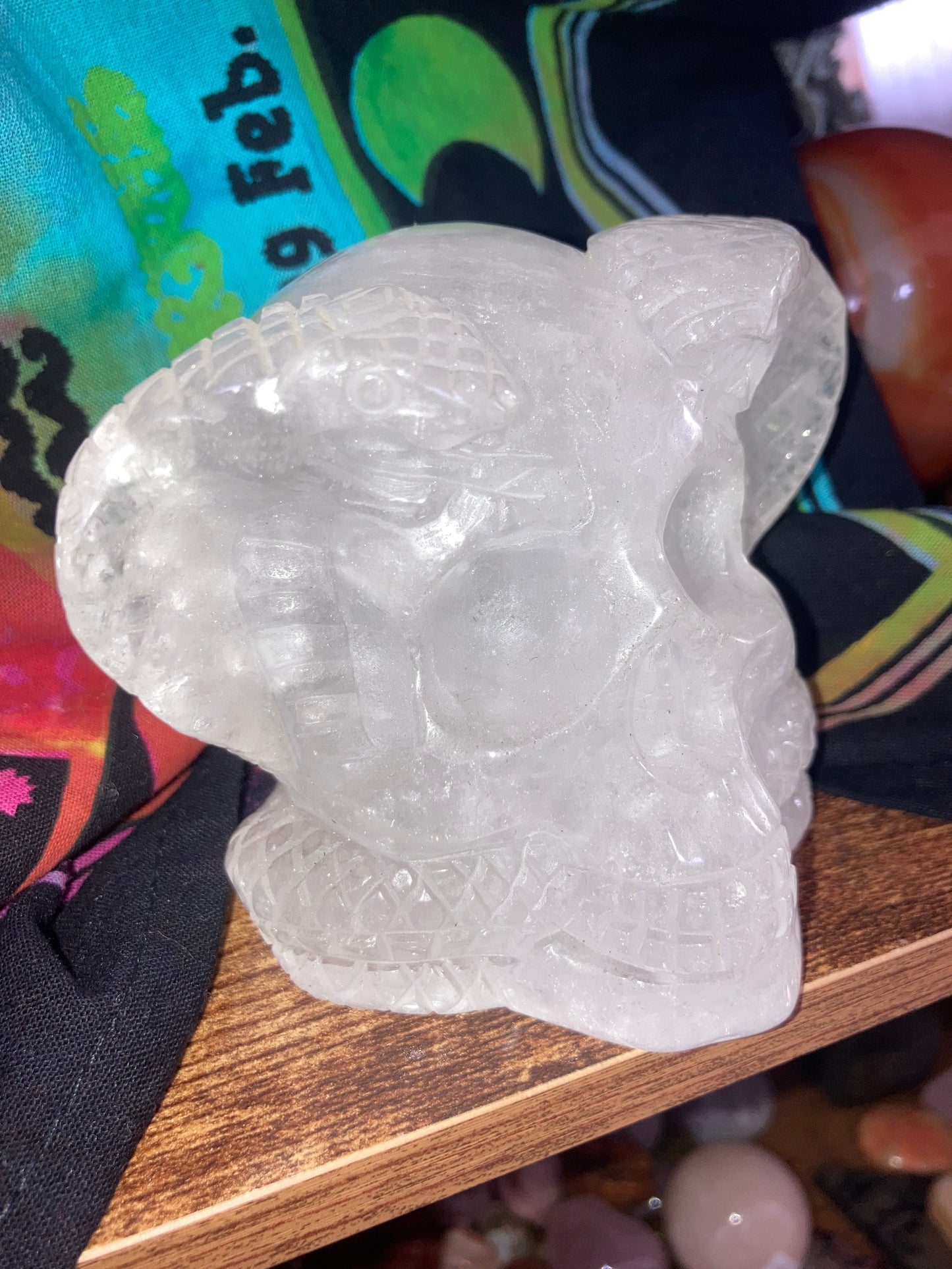 Clear Quartz Skull With Snakes Carving