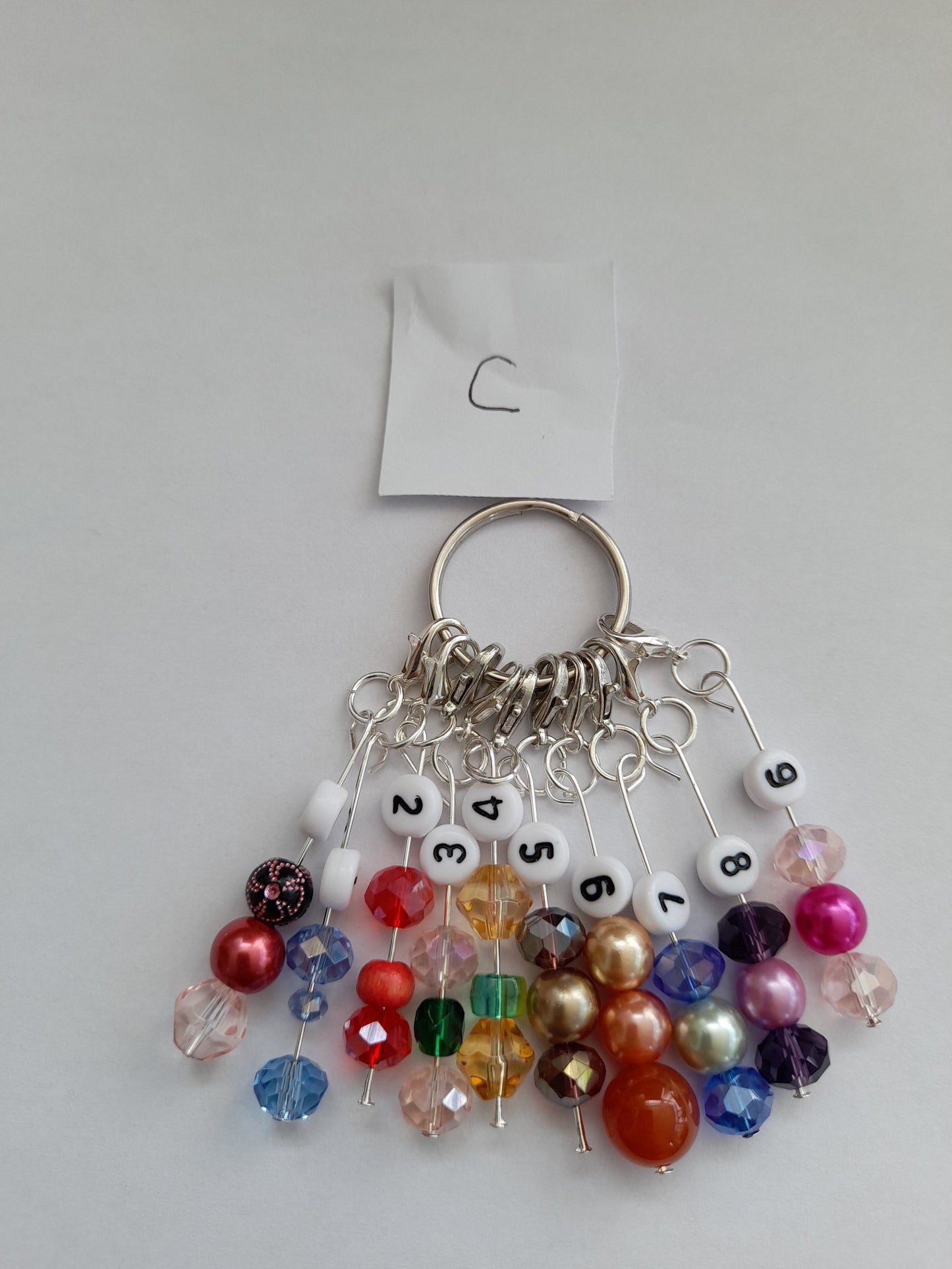 Row stitch markers for knitting, crochet