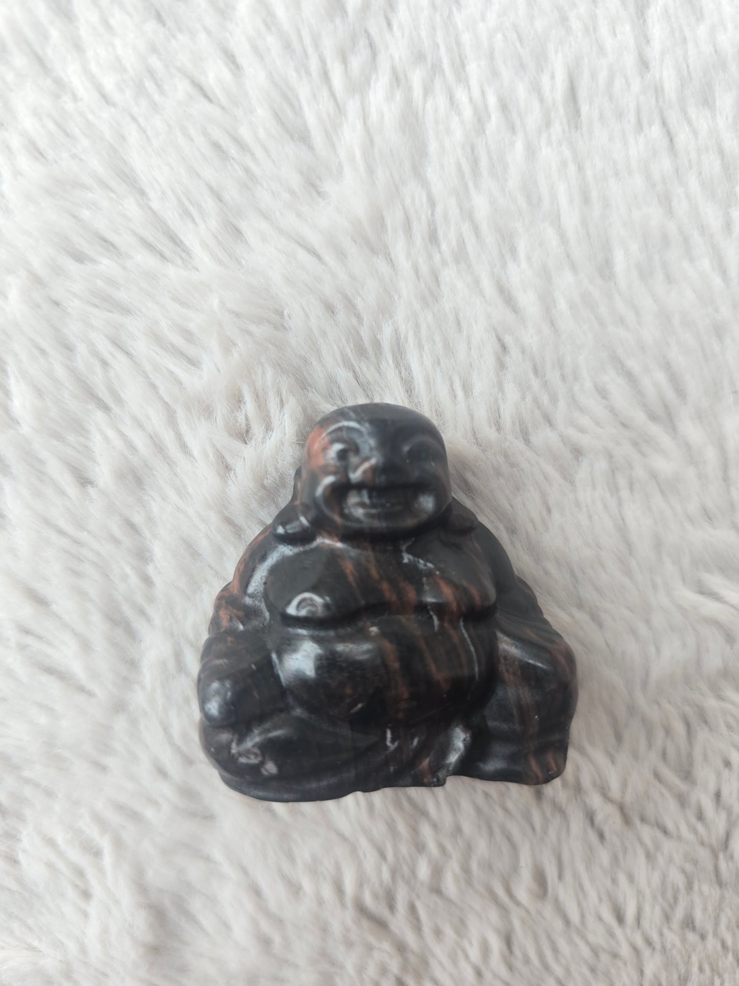 Laughing Buddha carvings