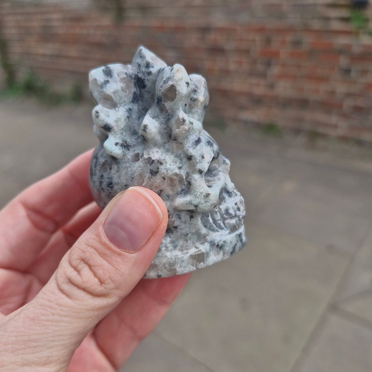 Kiwi Jasper Skull With Crystals Carving 127g