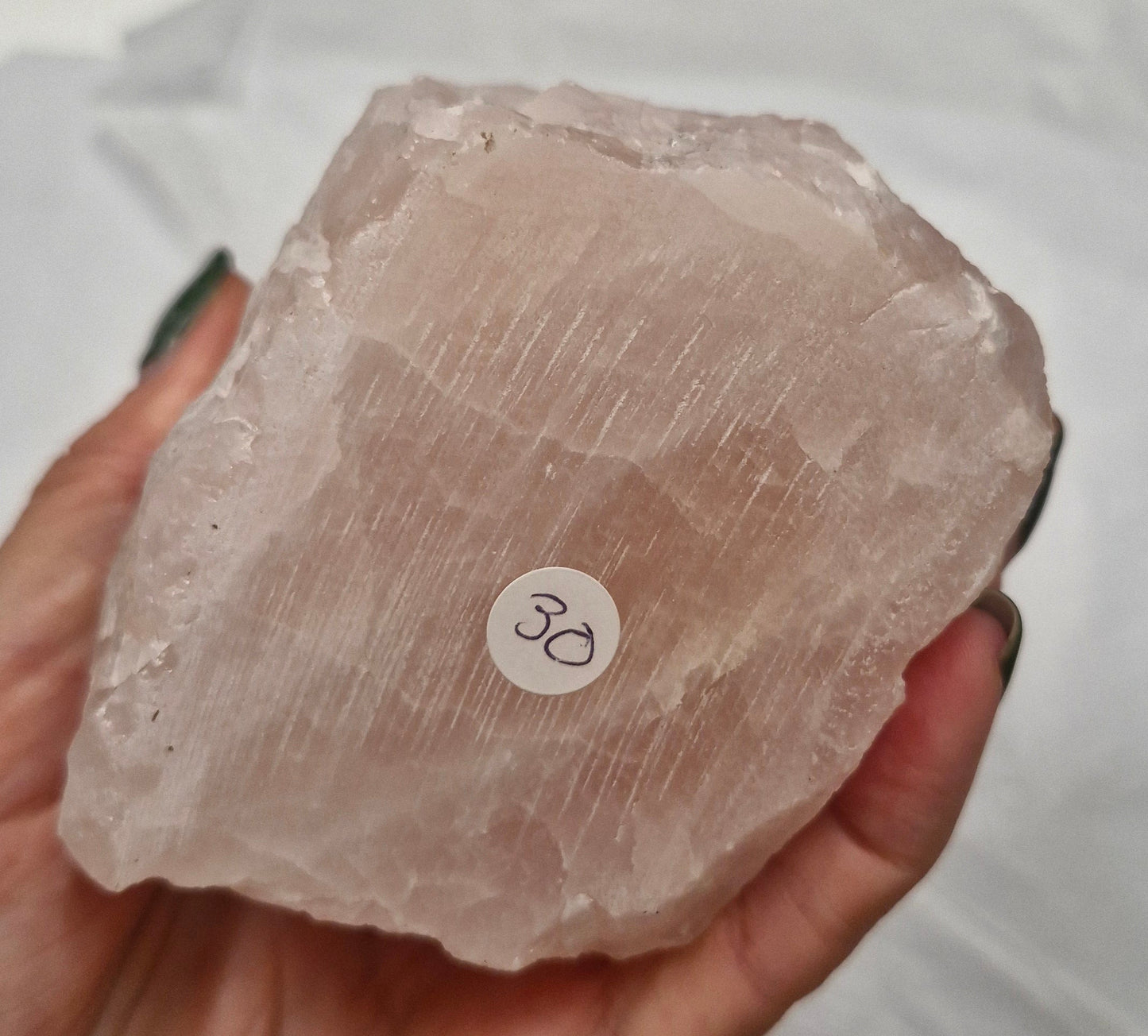 Raw rose quartz tower