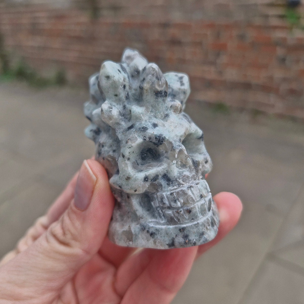 Kiwi Jasper Skull With Crystals Carving 127g