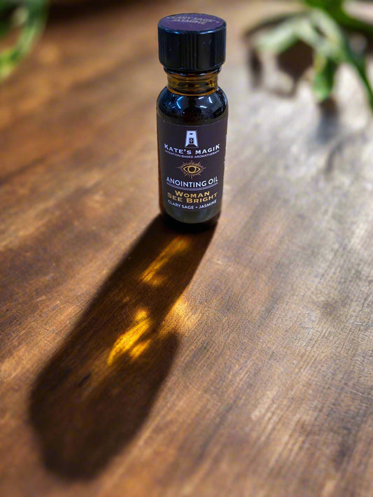 Small bottle of anointing oil on a wooden surface