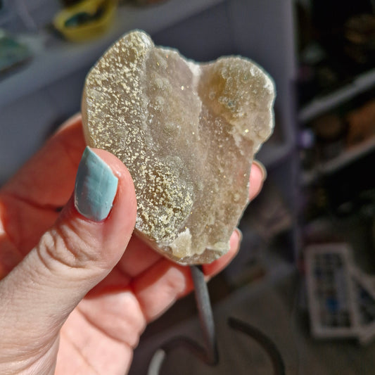 Grey sugary amethyst geode on stand