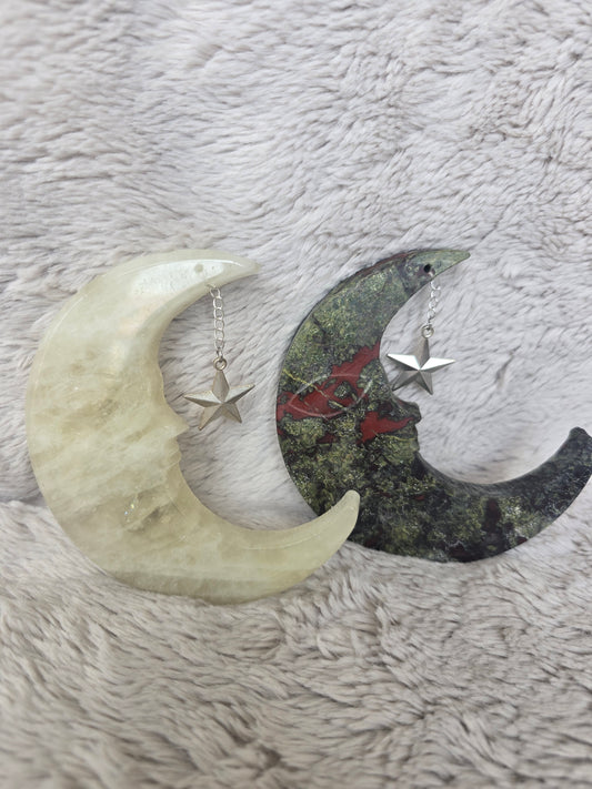 Crescent moon with star pendant