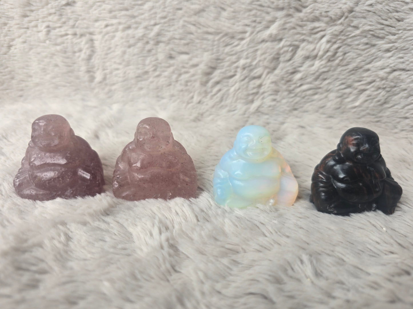 Laughing Buddha carvings