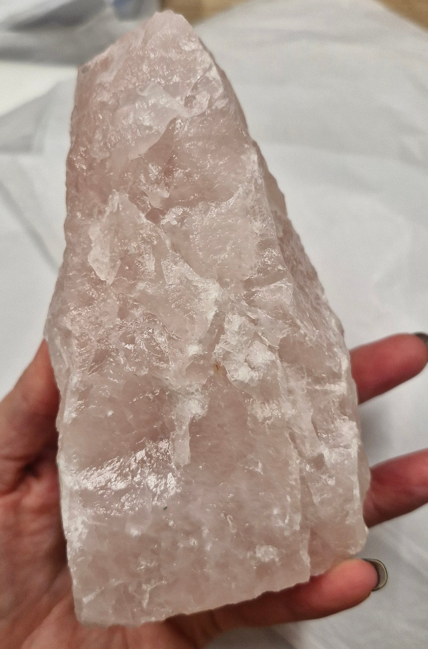 Raw rose quartz tower