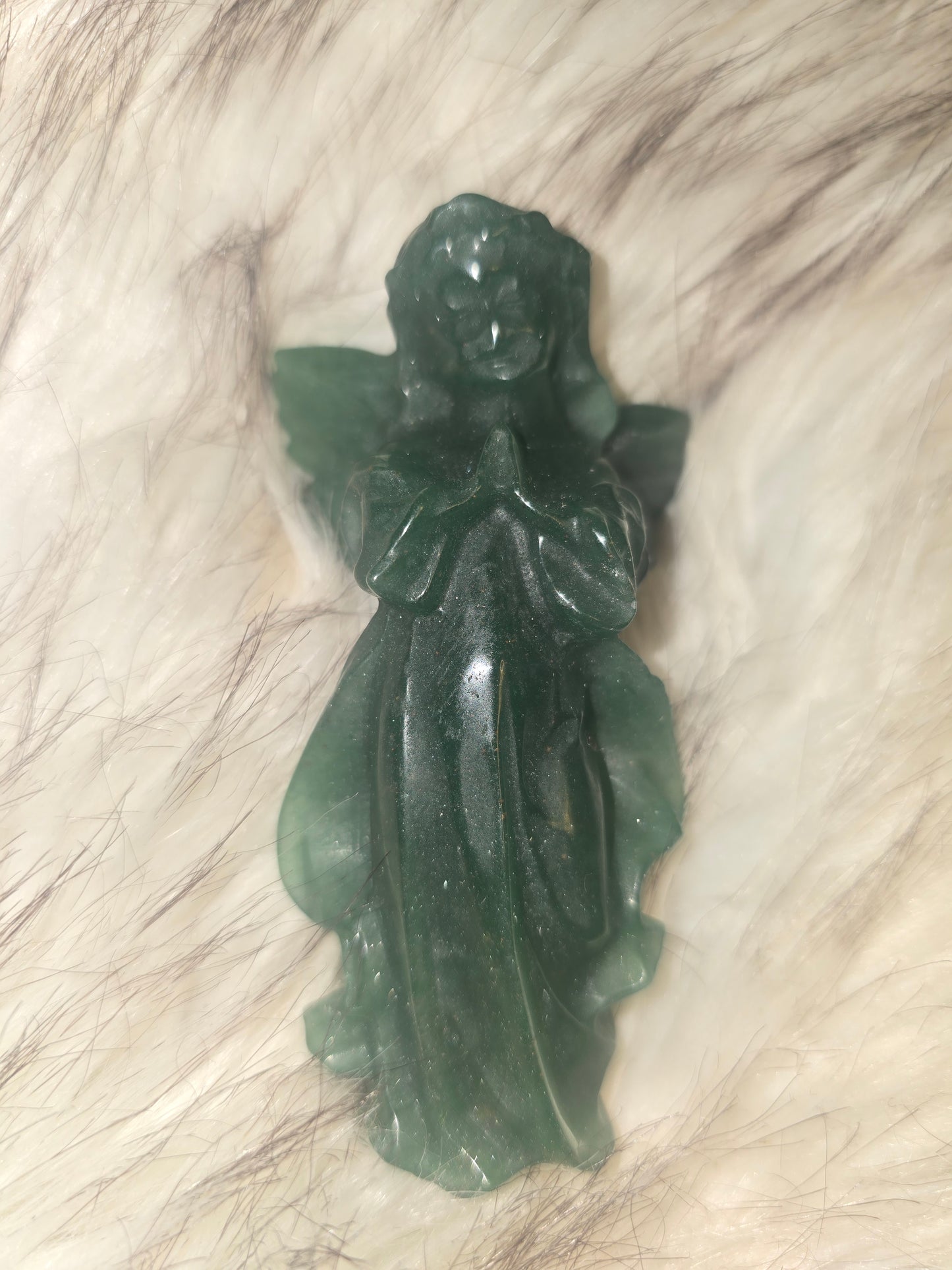 Carved green aventurine angel