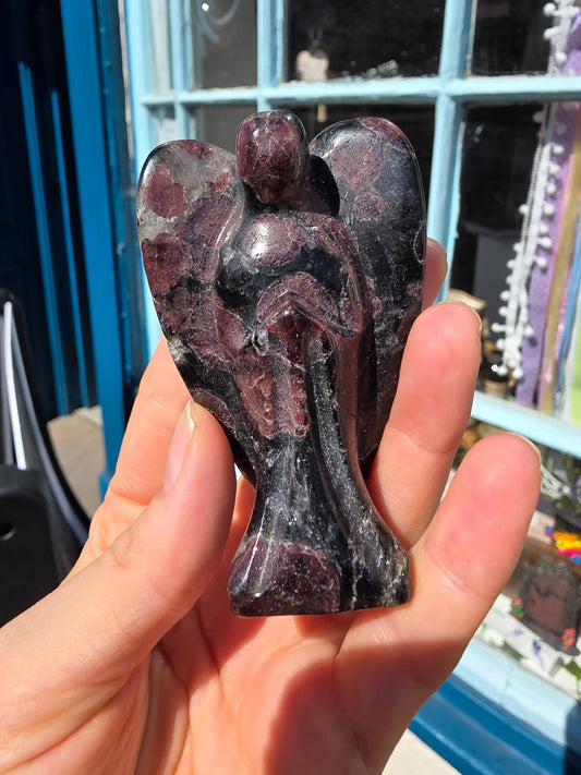 Garnet in arfednosite crystal Angel carving