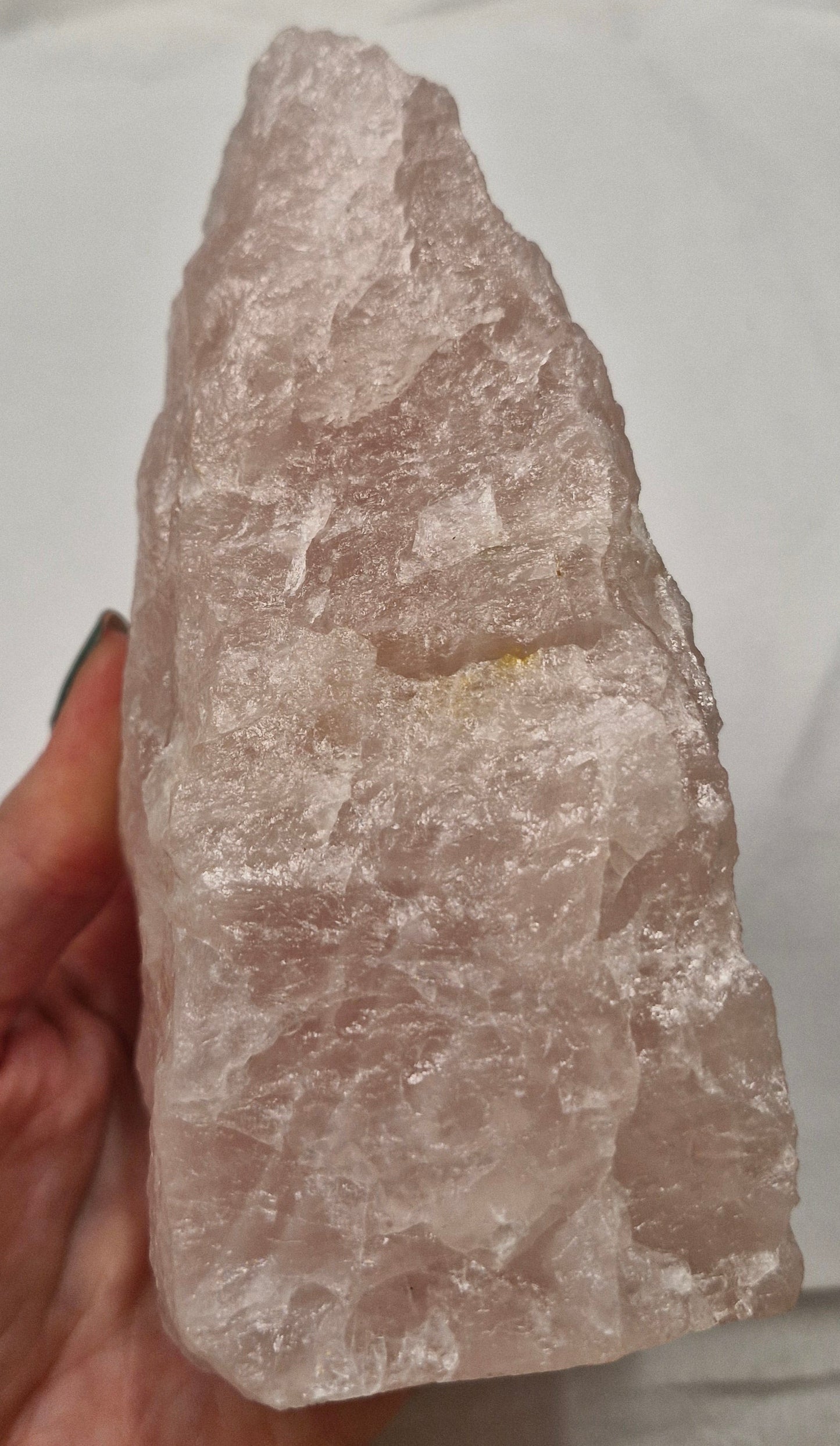 Raw rose quartz tower